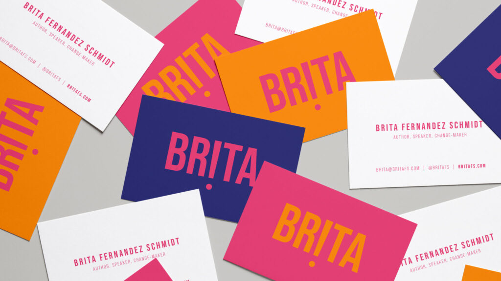 Colourful business cards feature big type and a bold but minimal design. Brand design for Brita Fernandez-Schmidt designed by Yoco Studio.